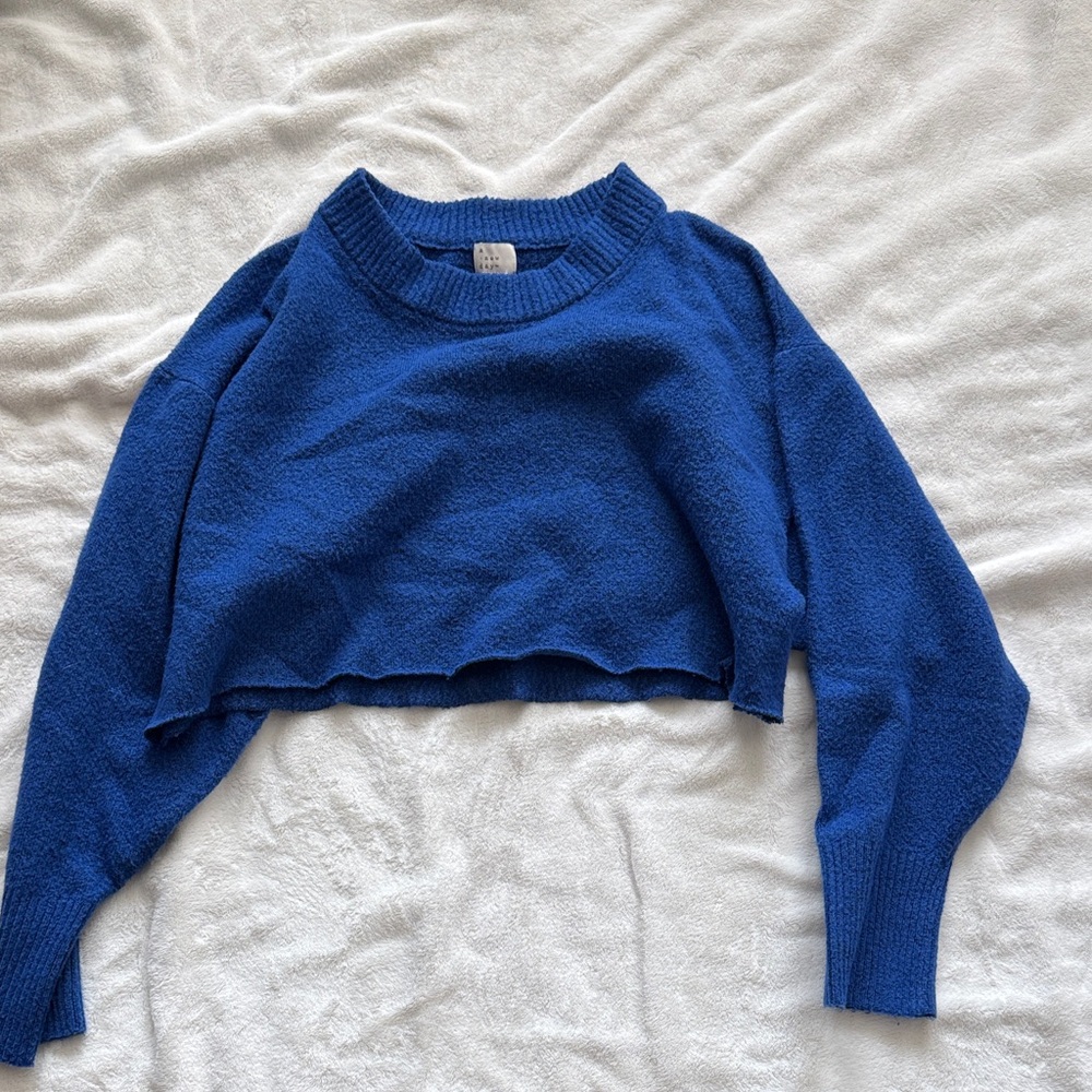 M a new day cropped Blue Sweater